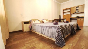 Водопійна 19 CityRooms